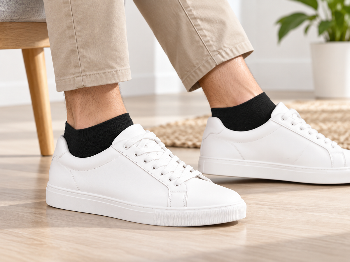 Black ankle socks worn with sneakers